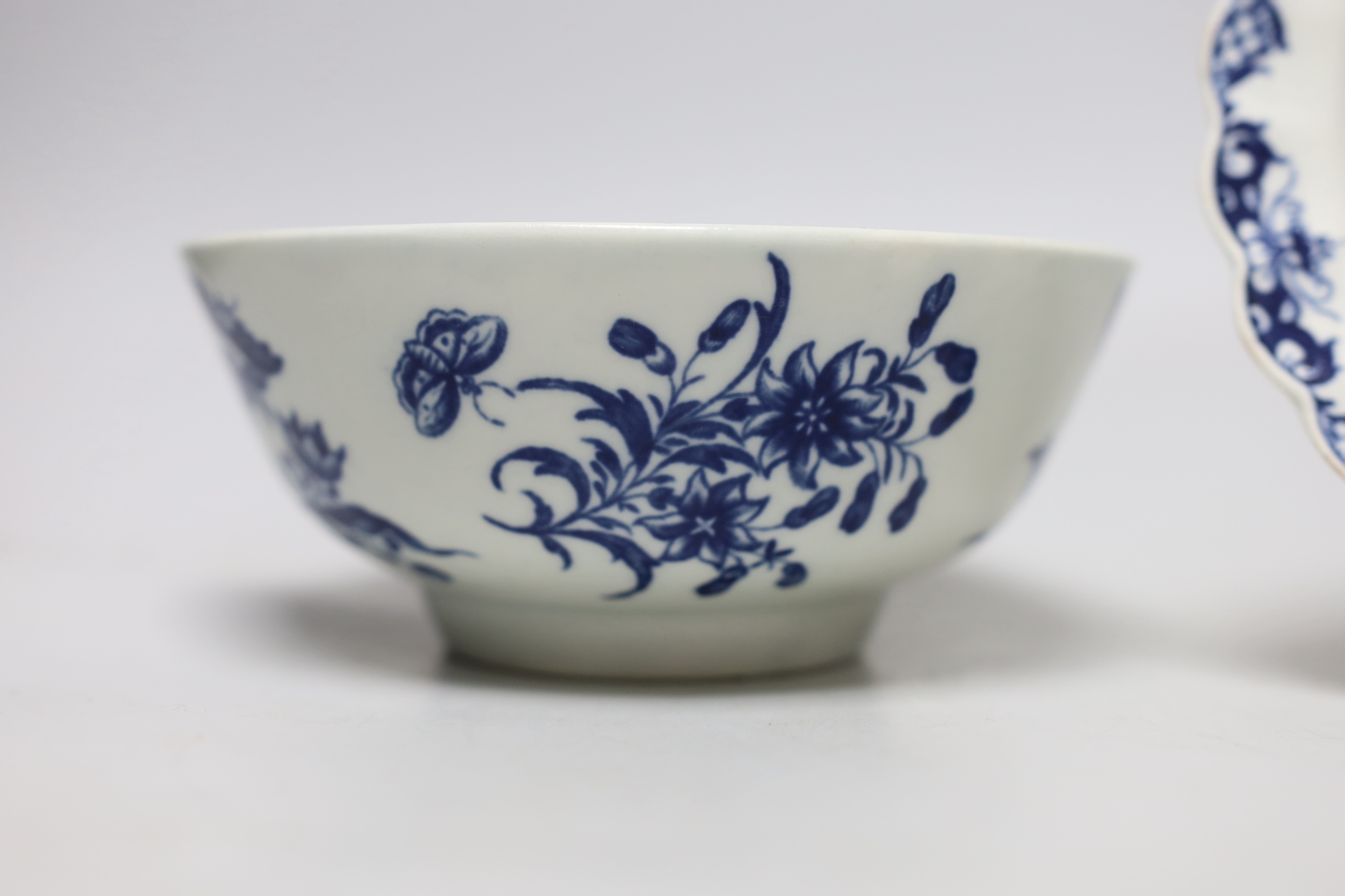 A Worcester Three Flowers pattern bowl and a Pine Cone pattern plate